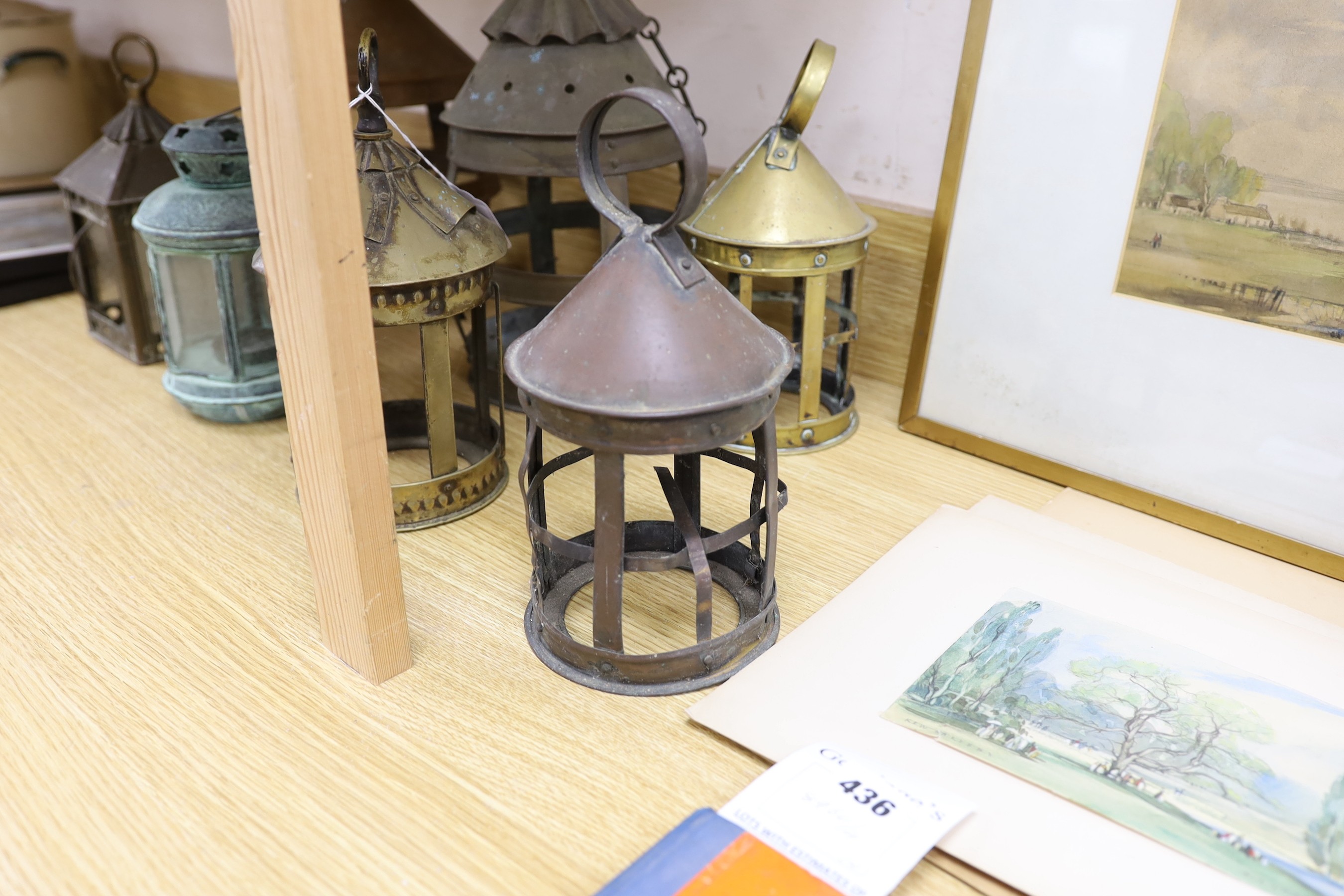 Seven brass and copper lanterns, tallest 35cms high